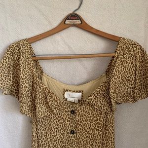 Anthropologie cheetah midi dress